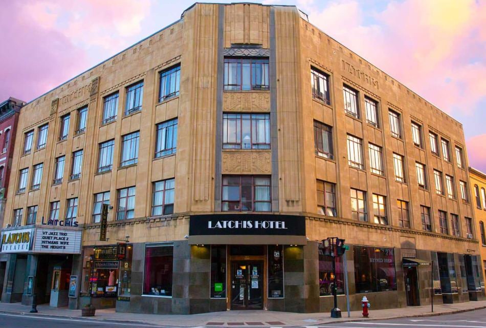 Exterior view of property which is an historic looking building on the corner of a downtown street