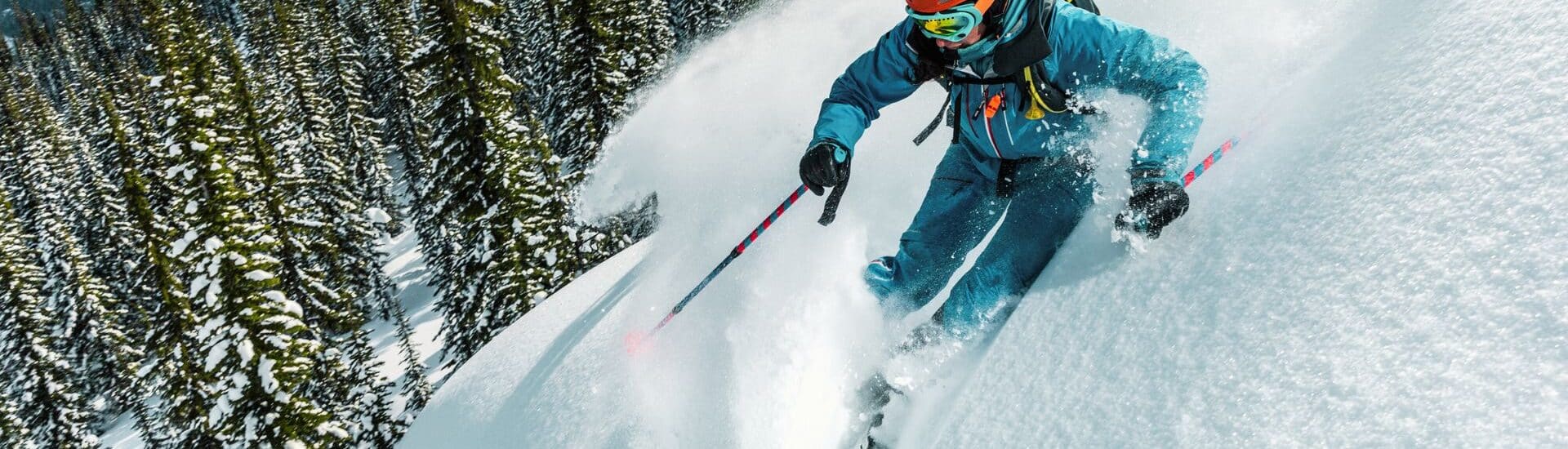 a person skiing down a winter slope