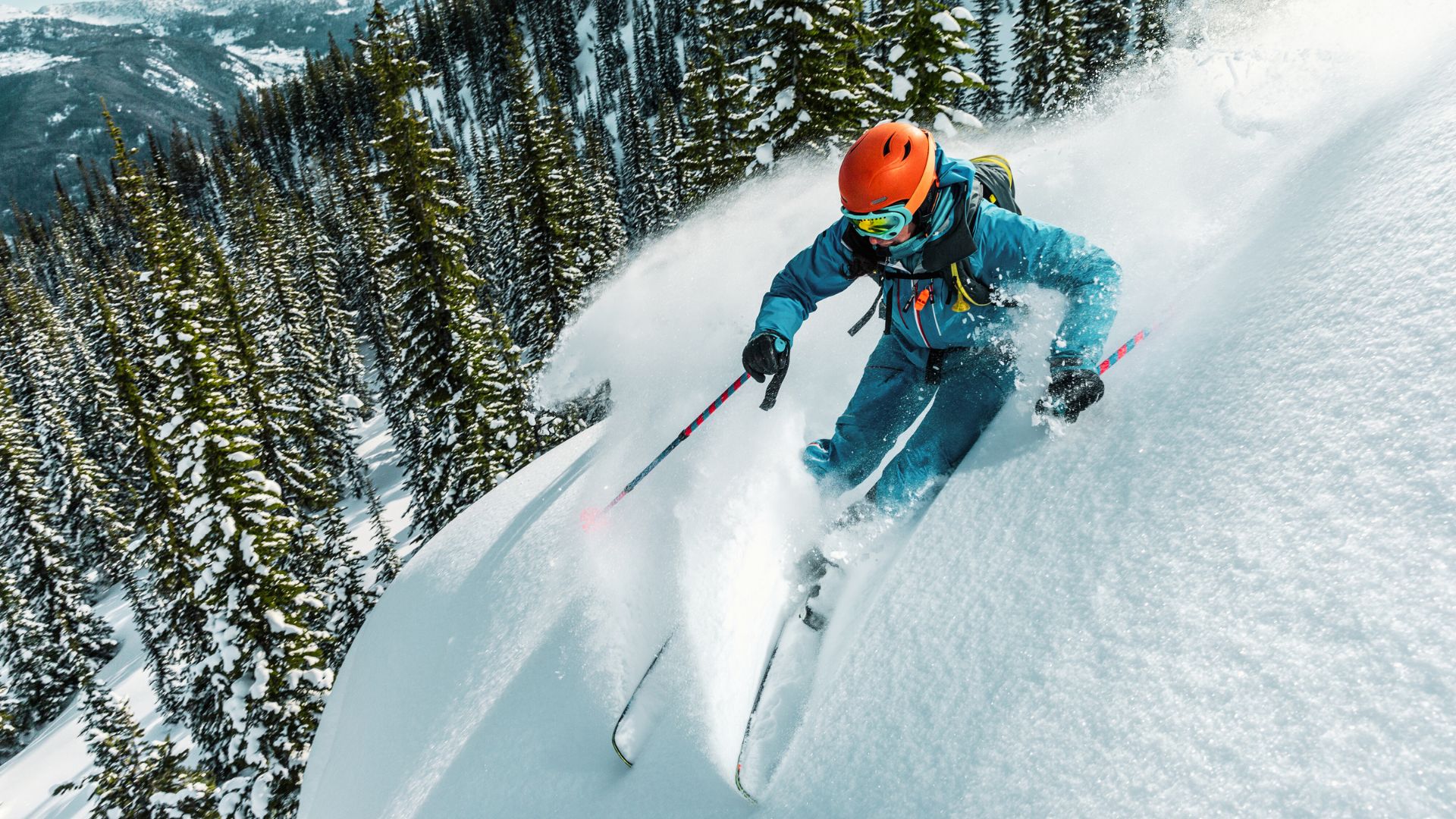 a person skiing down a winter slope